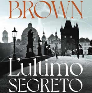 Copertina del libro "L'ultimo segreto" di Dan Brown, con un'immagine suggestiva di Praga in tonalità nero e grigio, evocando un'atmosfera di mistero.